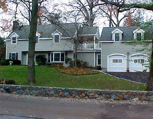 3 Woodland Road Norwalk, CT 06854 - Photo 1 of 1 a view of a house with a yard