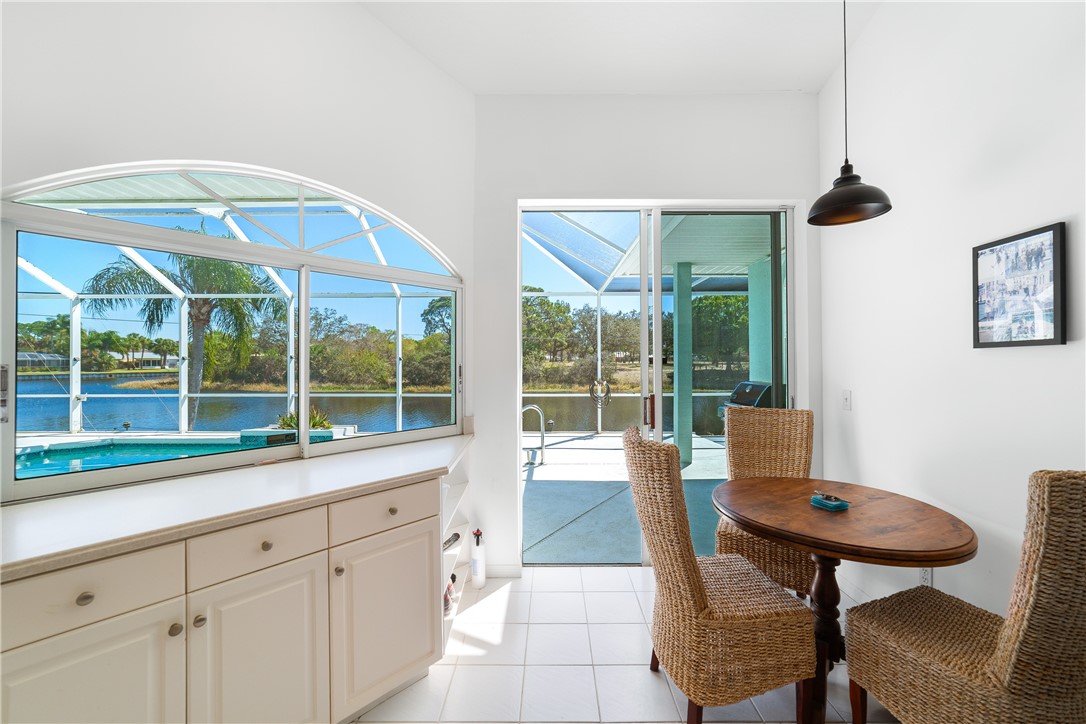 419 Ponoka Street Sebastian, FL 32958 - Photo 11 of 33 a living room with furniture and a window