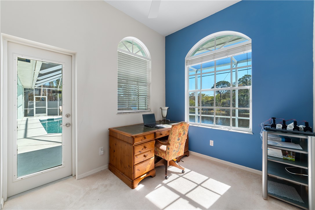 419 Ponoka Street Sebastian, FL 32958 - Photo 20 of 33 a living room with furniture and a window