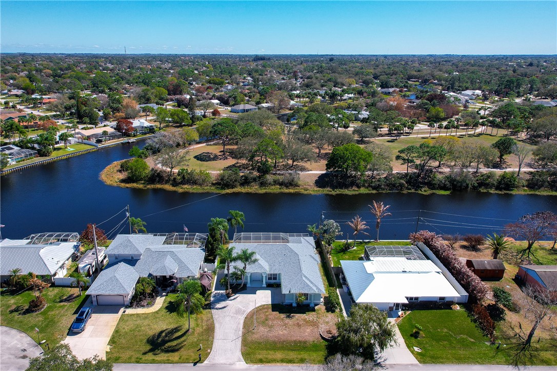 419 Ponoka Street Sebastian, FL 32958 - Photo 2 of 33 an aerial view of residential houses with outdoor space