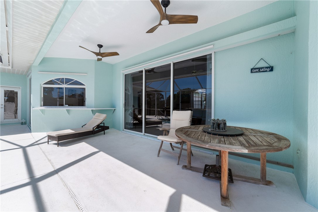 419 Ponoka Street Sebastian, FL 32958 - Photo 24 of 33 a living room with furniture and window