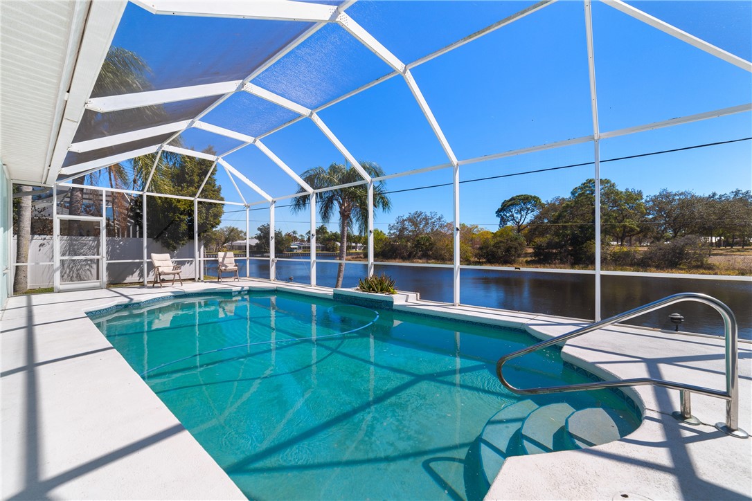 419 Ponoka Street Sebastian, FL 32958 - Photo 27 of 33 a view of a house with a backyard