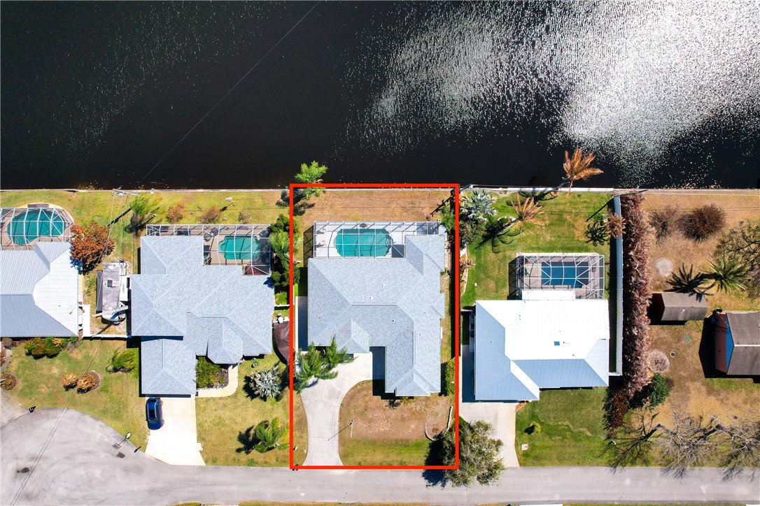 419 Ponoka Street Sebastian, FL 32958 - Photo 29 of 33 an aerial view of houses with yard