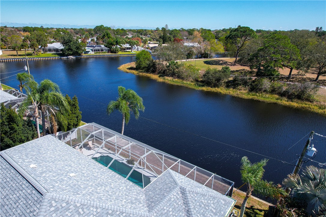 419 Ponoka Street Sebastian, FL 32958 - Photo 30 of 33 an aerial view of a house with a lake view