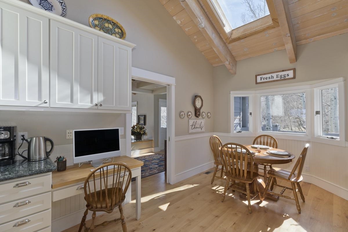 96 Aspen Spring Ranch Road Mammoth Lakes, CA 93546 - Photo 12 of 43 a view of a dining room with furniture and chandelier