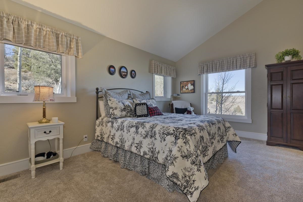 96 Aspen Spring Ranch Road Mammoth Lakes, CA 93546 - Photo 22 of 43 a bedroom with a bed and a window
