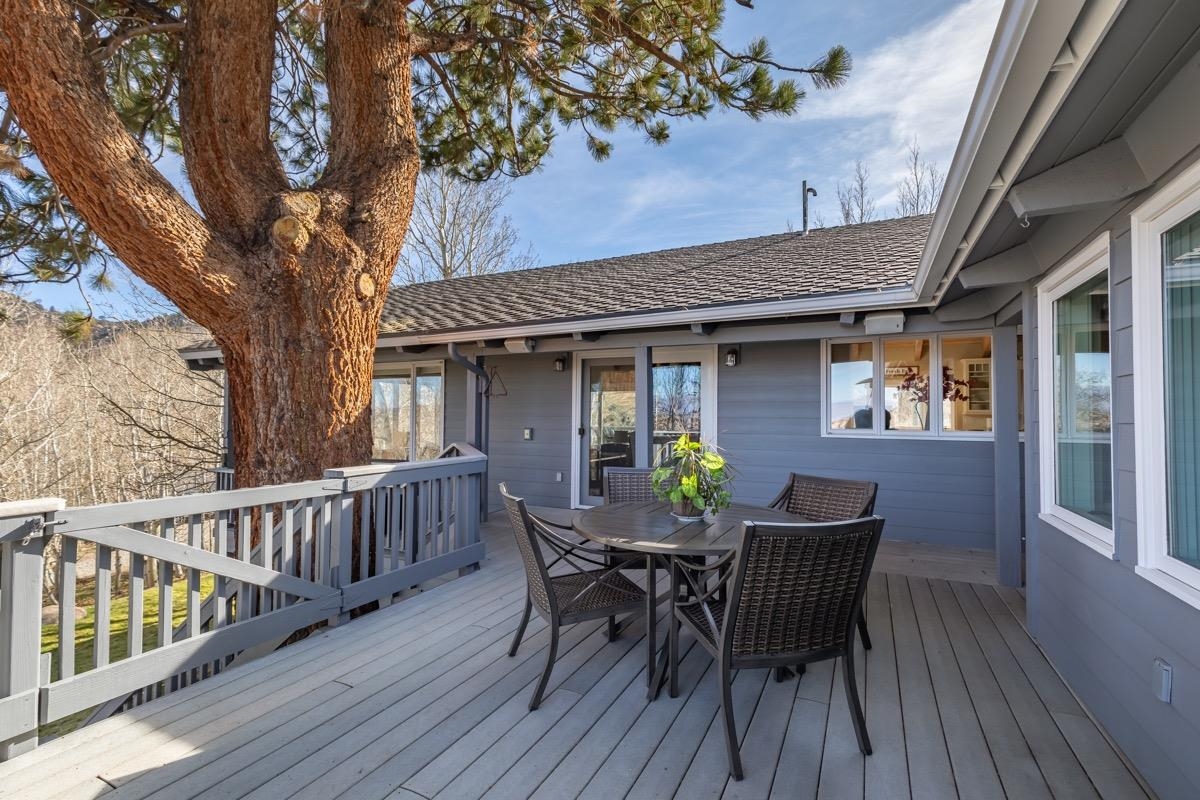 96 Aspen Spring Ranch Road Mammoth Lakes, CA 93546 - Photo 27 of 43 a view of a house with a porch and furniture