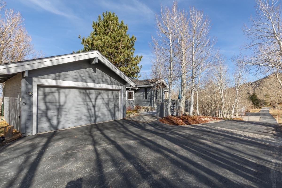 96 Aspen Spring Ranch Road Mammoth Lakes, CA 93546 - Photo 36 of 43 a front view of a house with a yard