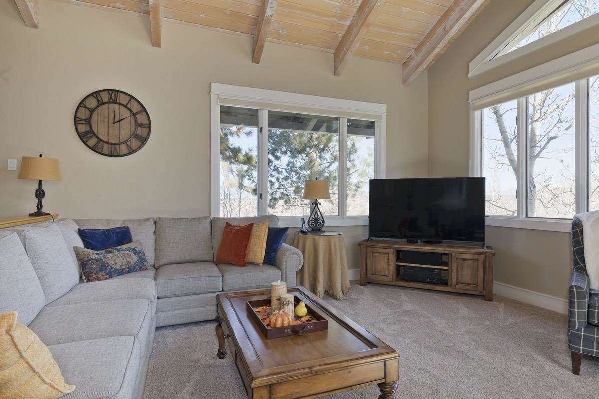 96 Aspen Spring Ranch Road Mammoth Lakes, CA 93546 - Photo 5 of 43 a living room with furniture and a flat screen tv