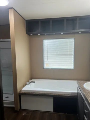 a bathroom with a sink and a bathtub