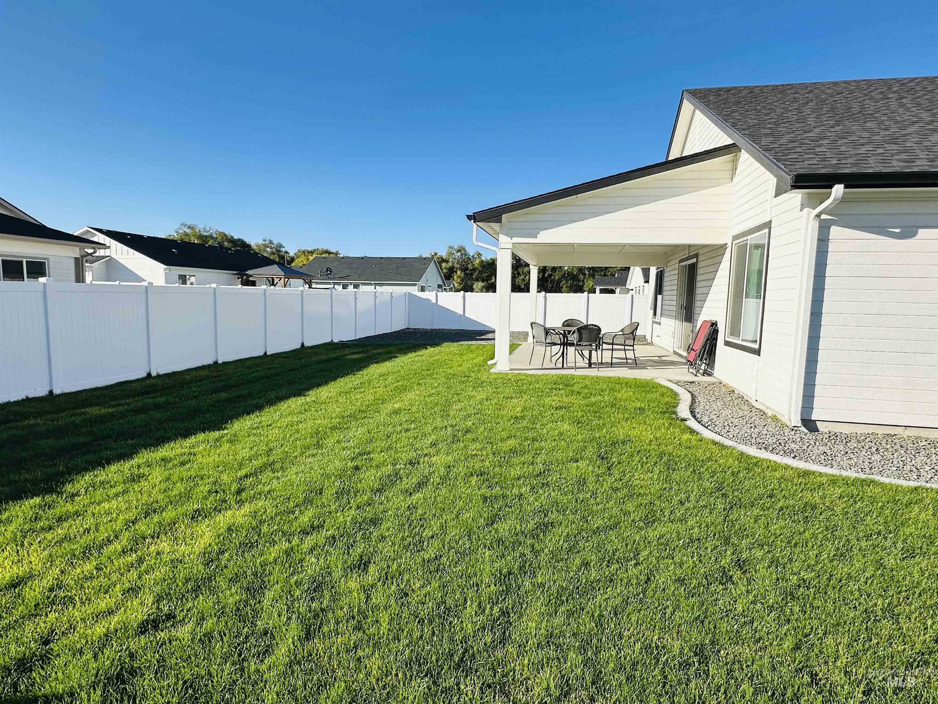 911 Campbell Street Vale, OR 97918 - Photo 29 of 37 Fenced backyard with a patio