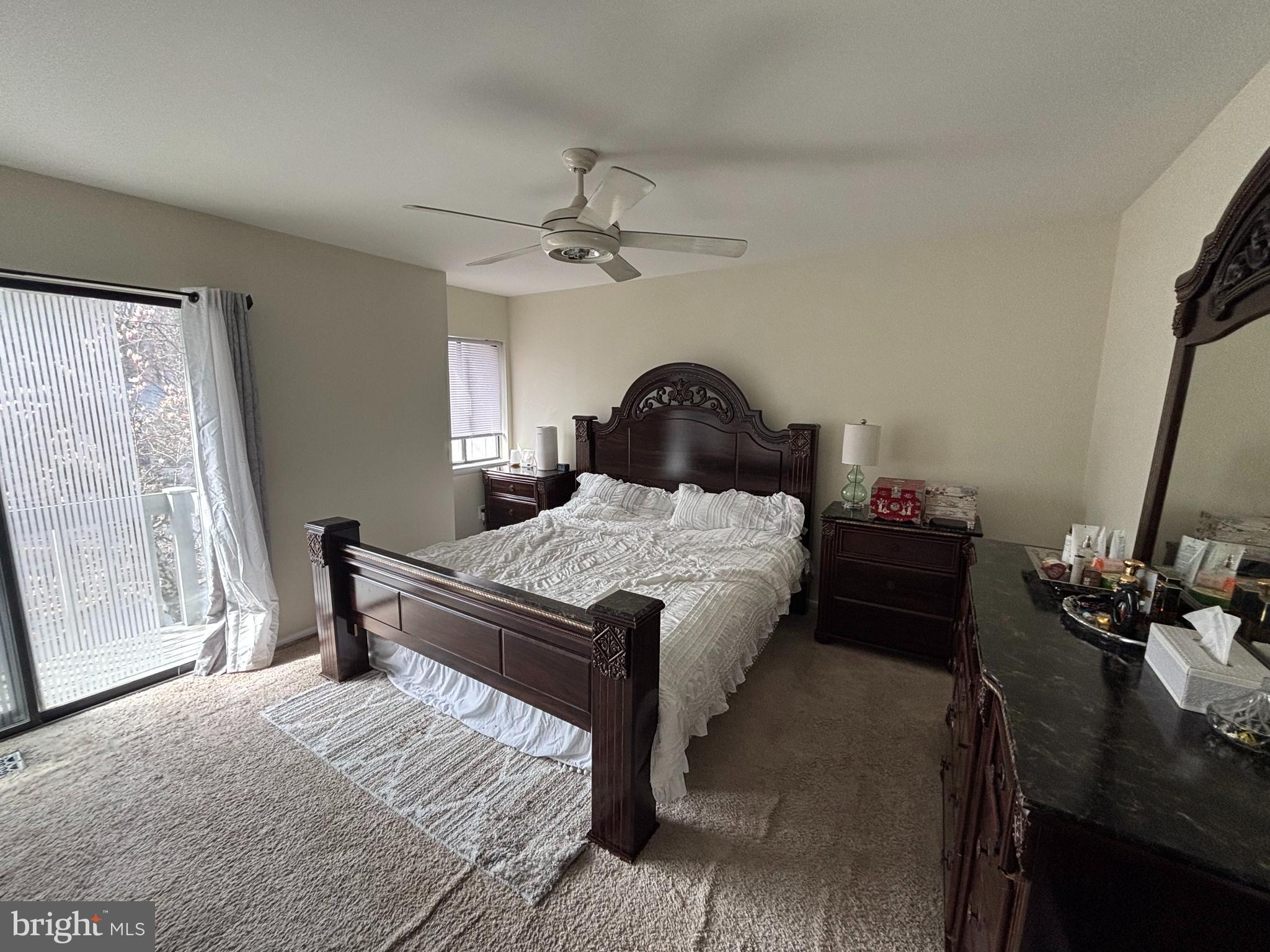 35 Harwood Lane Clementon, NJ 08021 - Photo 11 of 24 a bedroom with a bed and a chandelier