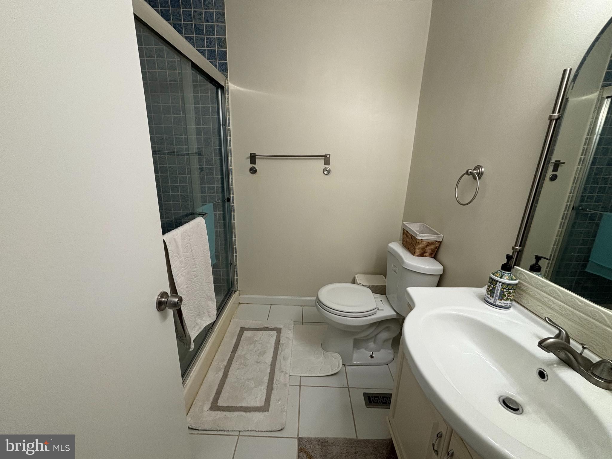 35 Harwood Lane Clementon, NJ 08021 - Photo 13 of 24 a bathroom with a sink toilet and shower