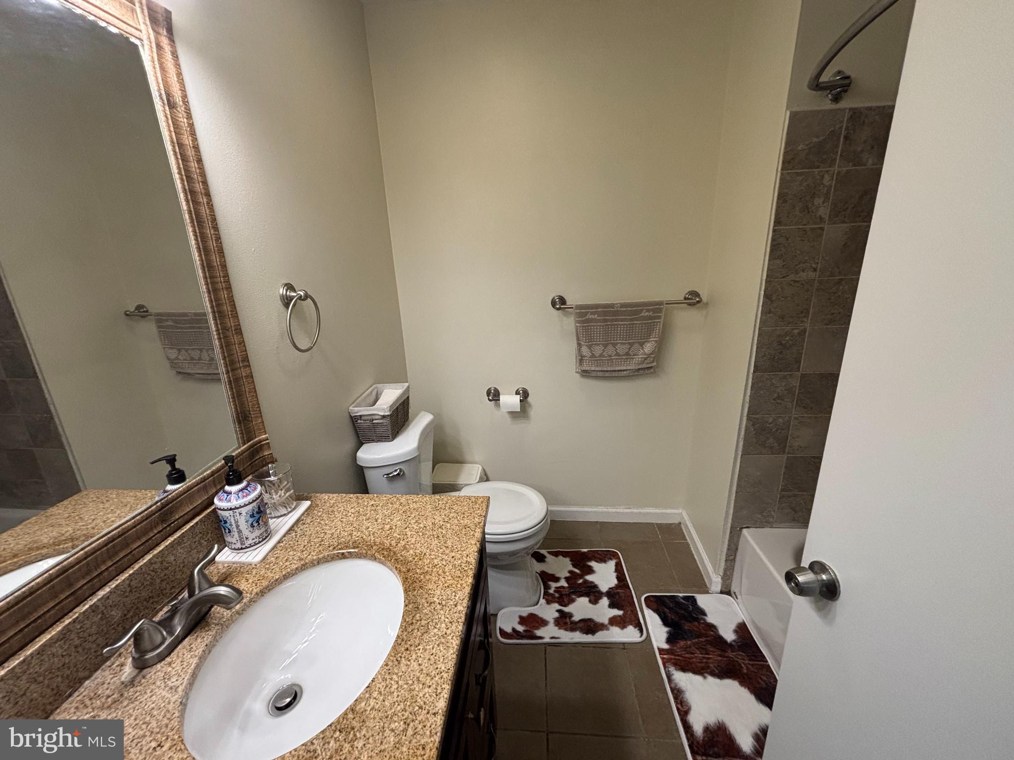 35 Harwood Lane Clementon, NJ 08021 - Photo 14 of 24 a bathroom with a sink and mirror with toilet