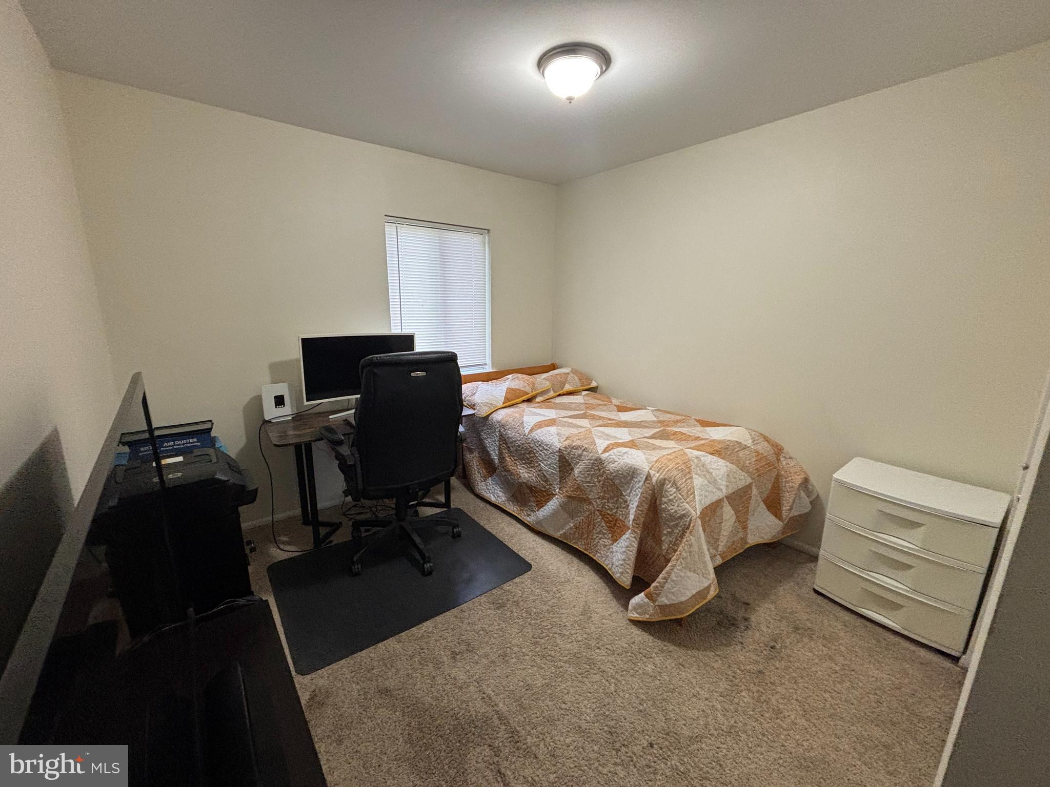 35 Harwood Lane Clementon, NJ 08021 - Photo 16 of 24 a bedroom with a bed and a desk