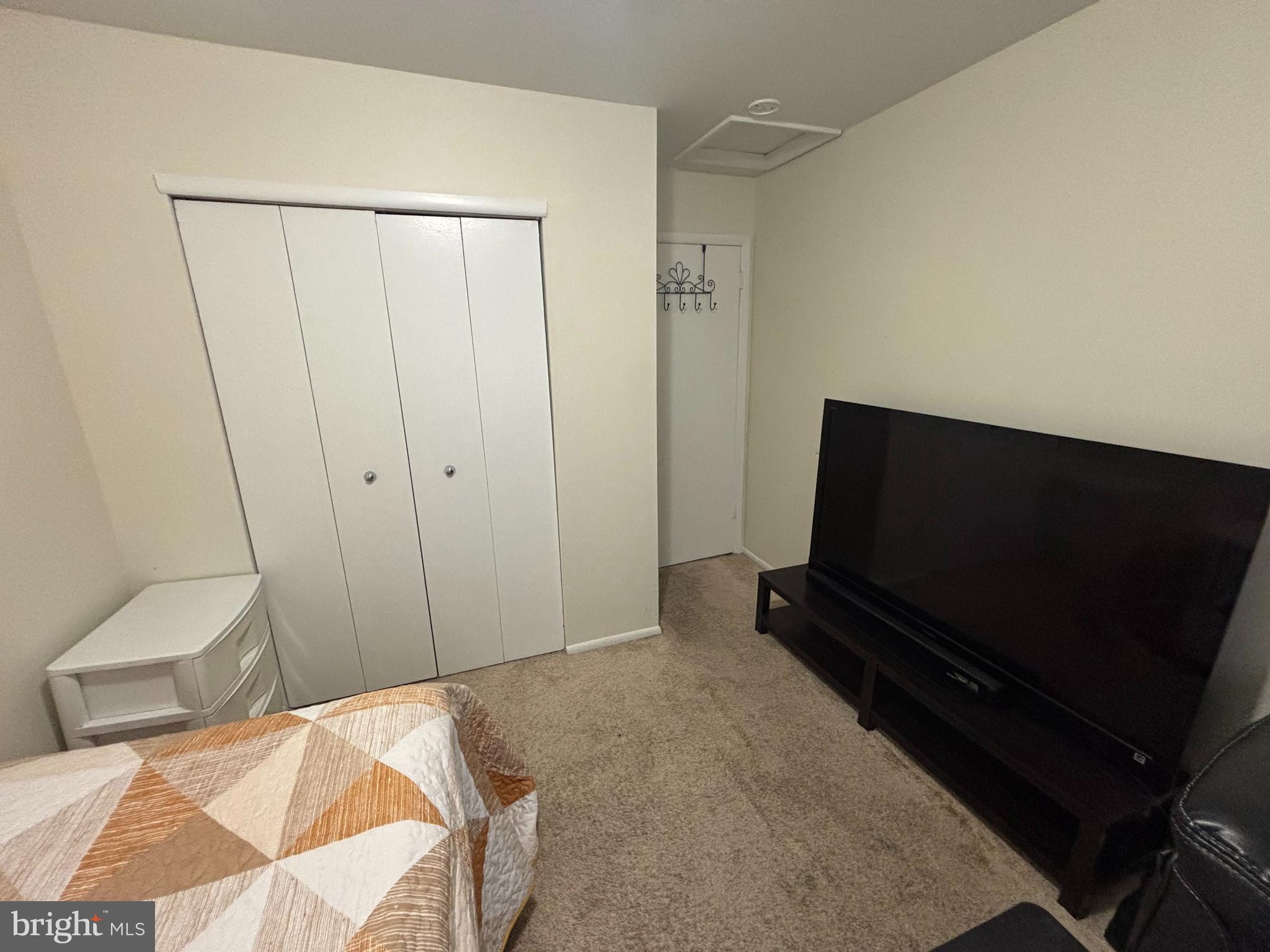 35 Harwood Lane Clementon, NJ 08021 - Photo 17 of 24 a bedroom with a bed and a flat tv screen on the dresser