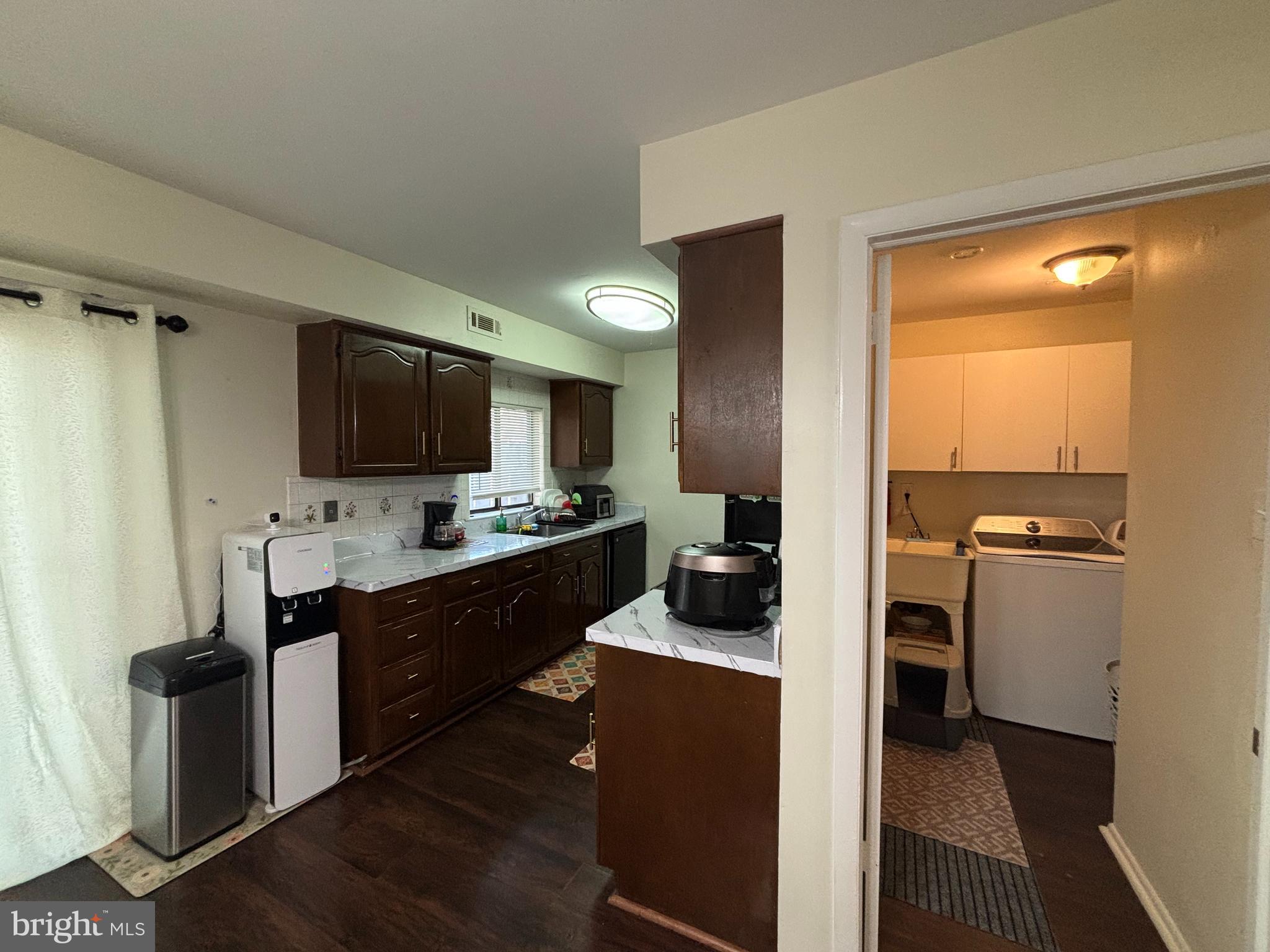 35 Harwood Lane Clementon, NJ 08021 - Photo 6 of 24 a open kitchen with cabinets microwave and stove top oven