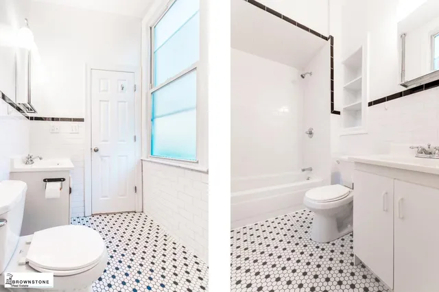 a bathroom with a toilet a sink and a shower