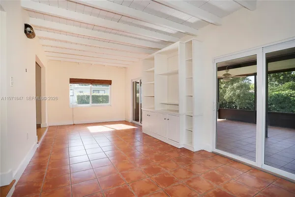 a view of an empty room and window