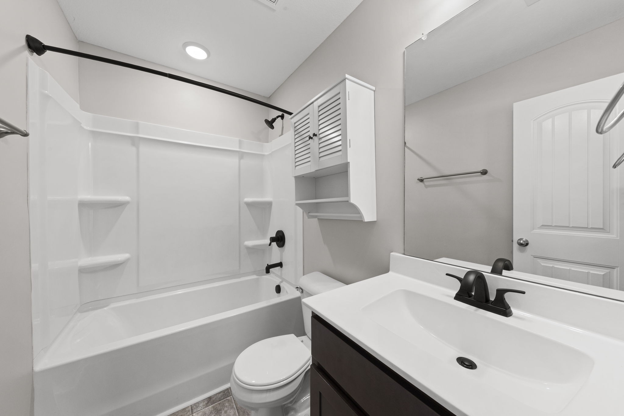 119 Davis Ridge Lane Clarksville, TN 37040 - Photo 24 of 30 a bathroom with a sink mirror toilet and bathtub