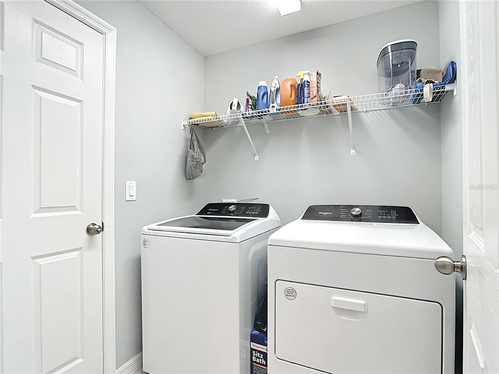 2713 Embassy Road North Port, FL 34291 - Photo 23 of 30 a utility room with dryer and washer