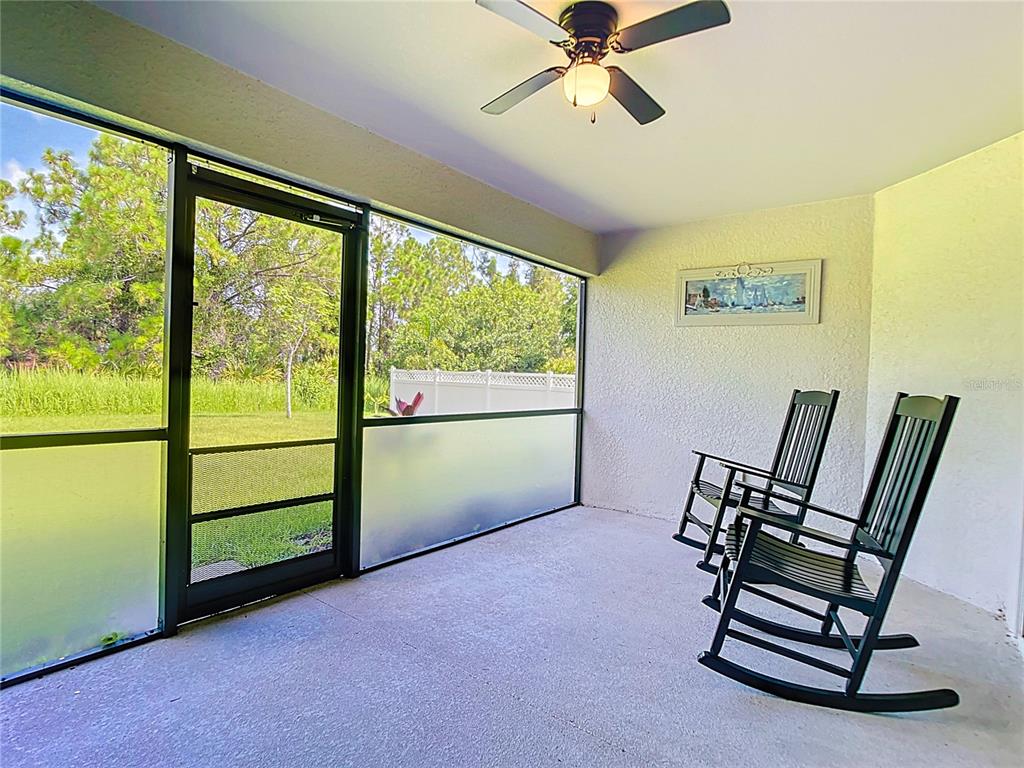 2713 Embassy Road North Port, FL 34291 - Photo 25 of 30 a view of room with window and hardwood floor