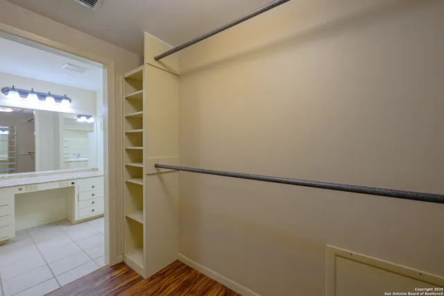 a view of walk in closet with window