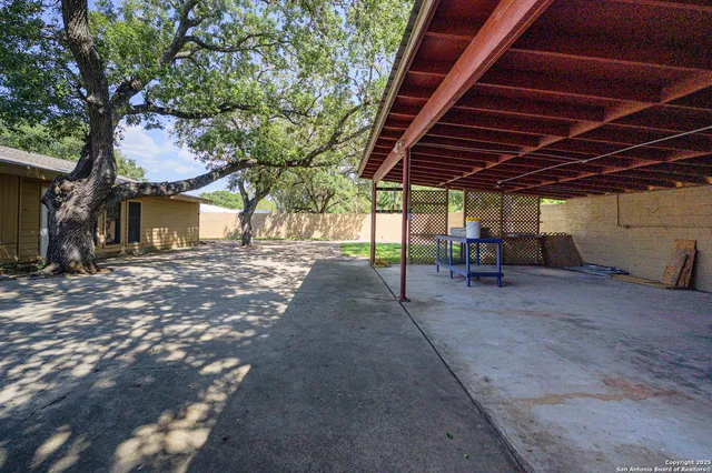 a view of a backyard of a house