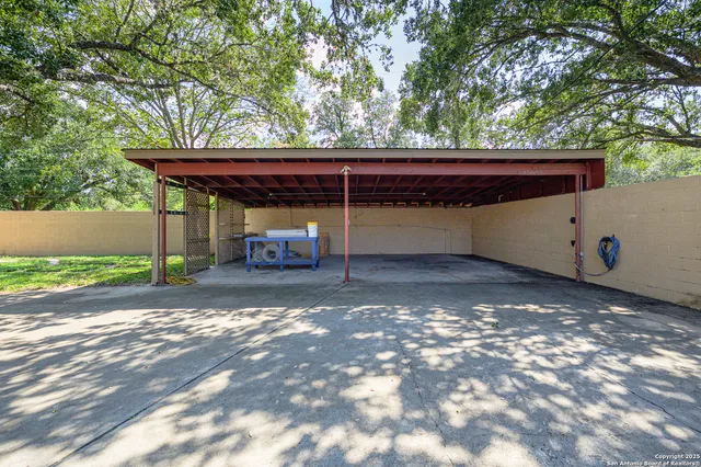 a view of an empty room and cabinet