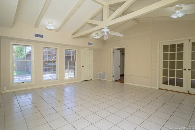 en empty room with windows