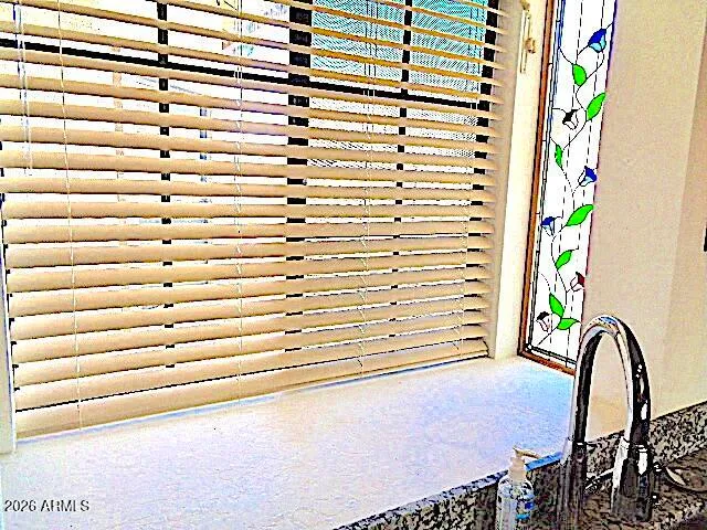 a view of a room with a bench