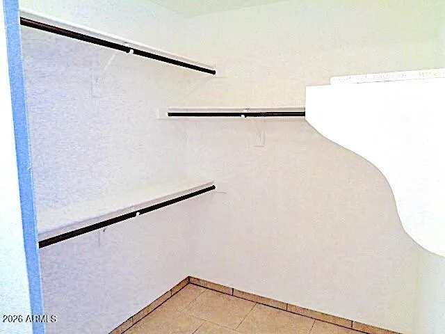 a view of a refrigerator in kitchen