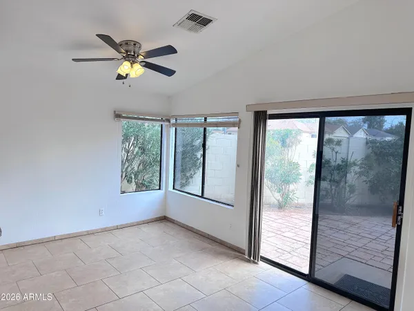 a view of an empty room and window