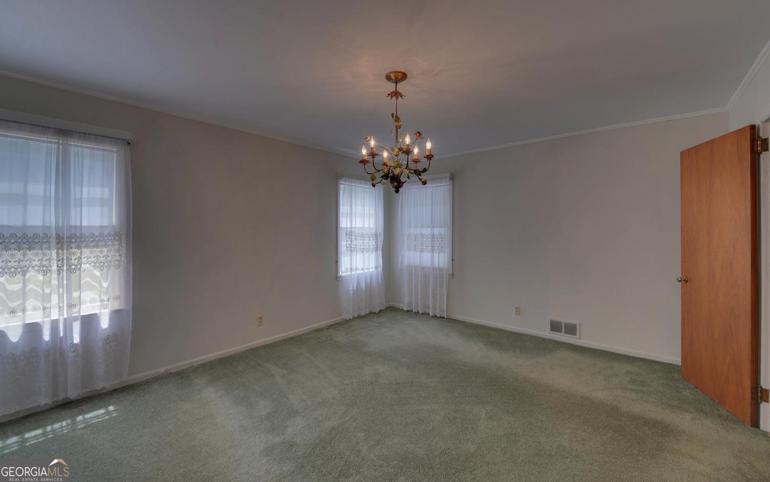 400 Harris Street Toccoa, GA 30577 - Photo 25 of 49 a view of an empty room with a window