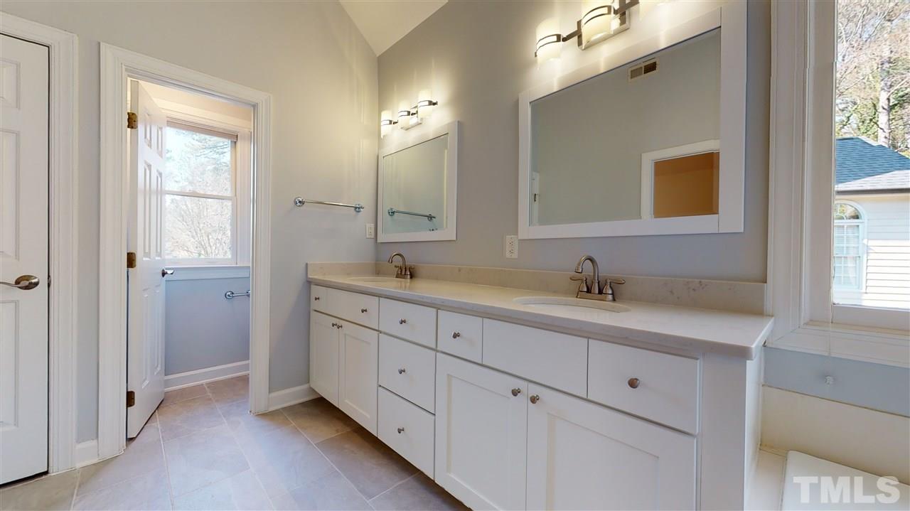 2900 Lothian Way Raleigh, NC 27612 - Photo 17 of 30 Quartz countertop, new faucets, new cabinets, new mirrors, new floor, new!!
