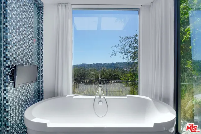 a bathroom with a bathtub