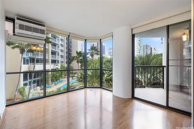 a view of a glass door with a balcony
