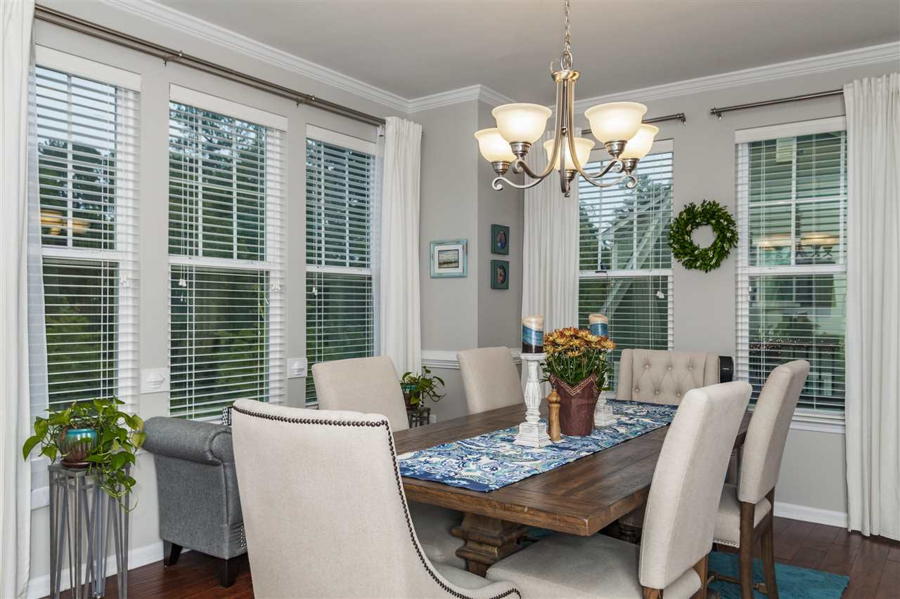 1434 Van Page Boulevard Raleigh, NC 27607 - Photo 10 of 25 Dining area right next to kitchen adds to this beautiful open second floor. Enjoy the deck right off the dining room, perfect to spend some time outside or to entertain guests! Dining