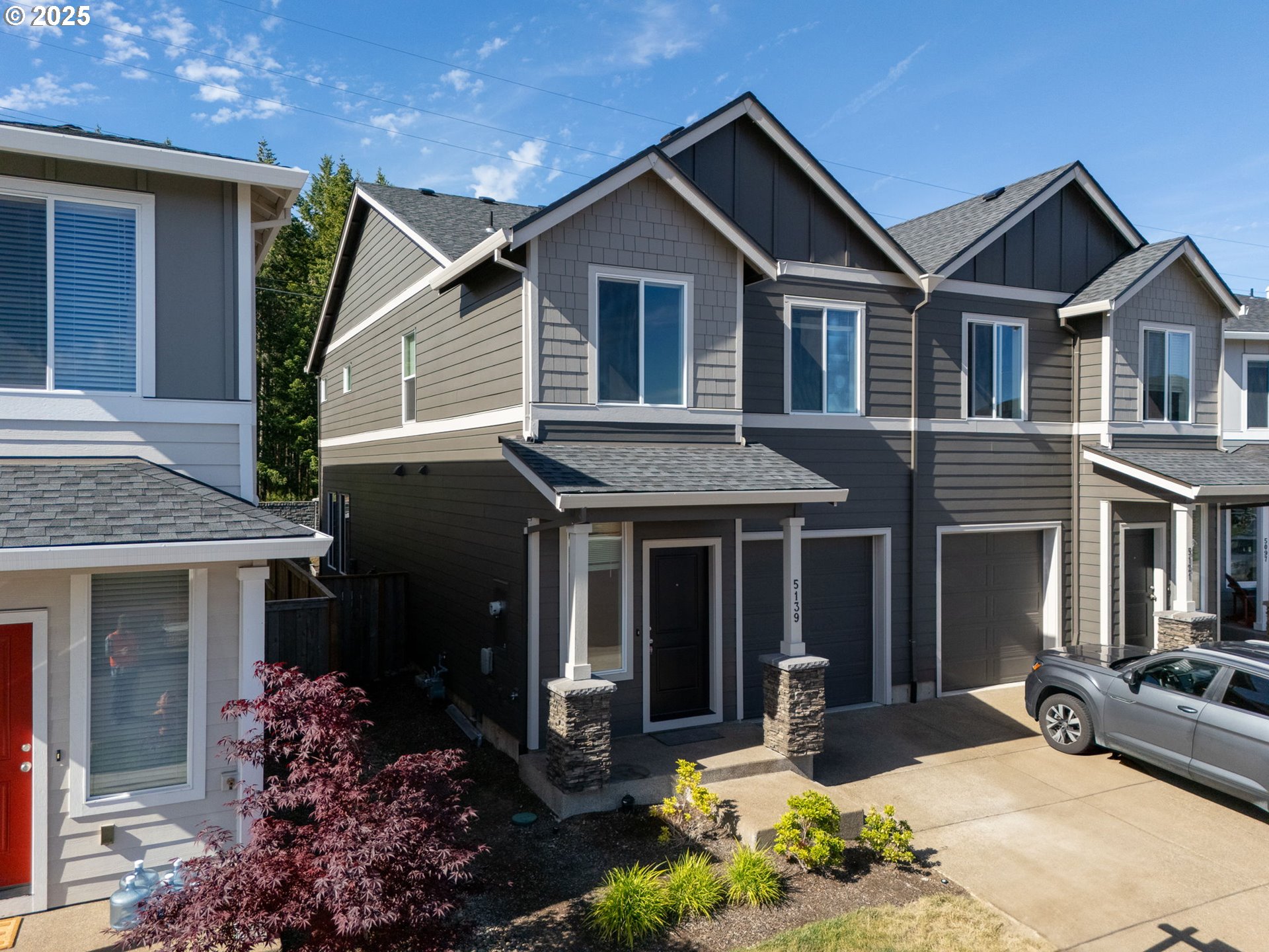 5139 Northwest Torchcrest Place Corvallis, OR 97330 - Photo 2 of 48 a front view of a house with a yard and outdoor seating