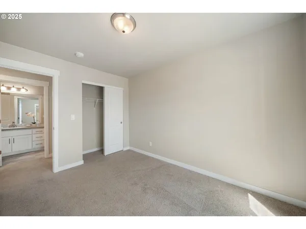 a bed room with a bed and a chandelier