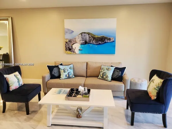 a living room with furniture and a couch