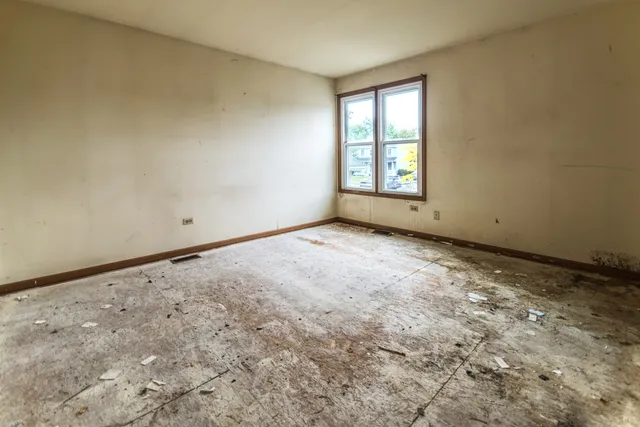 an empty room with a window