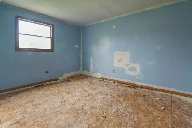 an empty room with a window