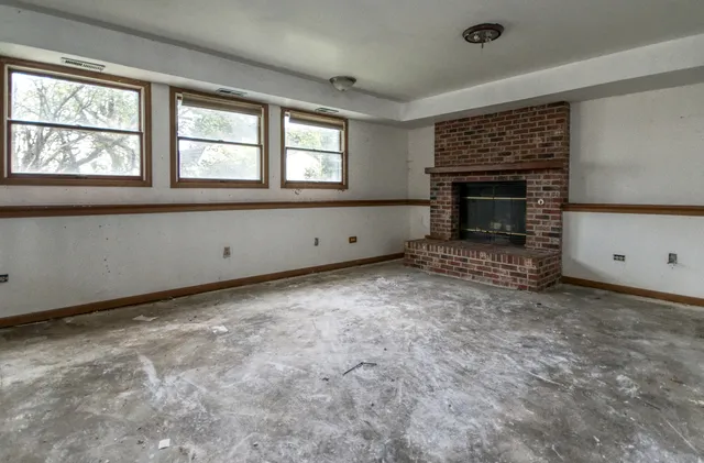 an empty room with windows