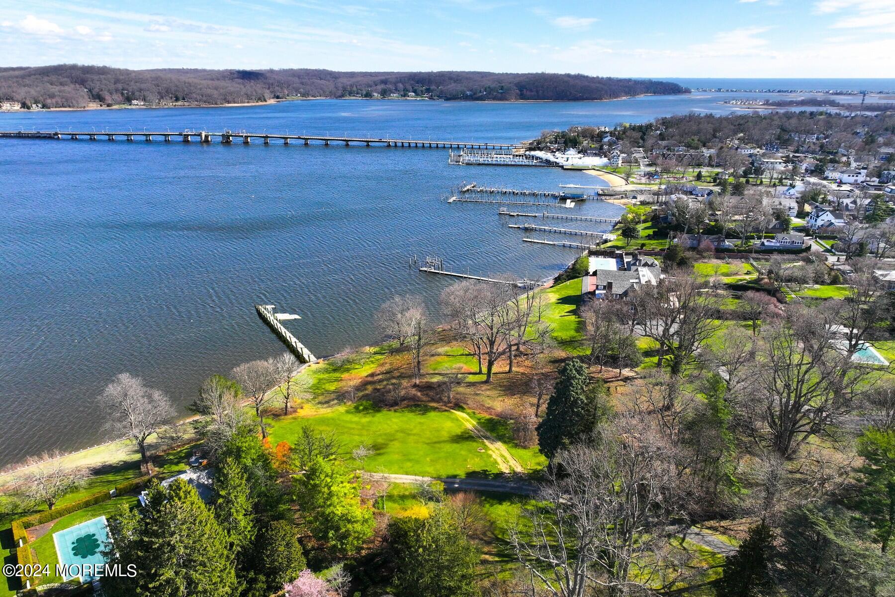 70 River Road Rumson, NJ 07760 - Photo 14 of 30 an aerial view of a house with a yard
