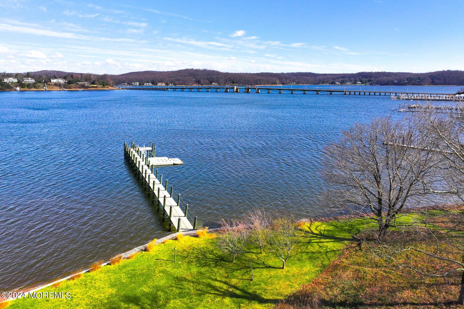 70 River Road Rumson, NJ 07760 - Photo 20 of 30 a view of a lake with a mountain