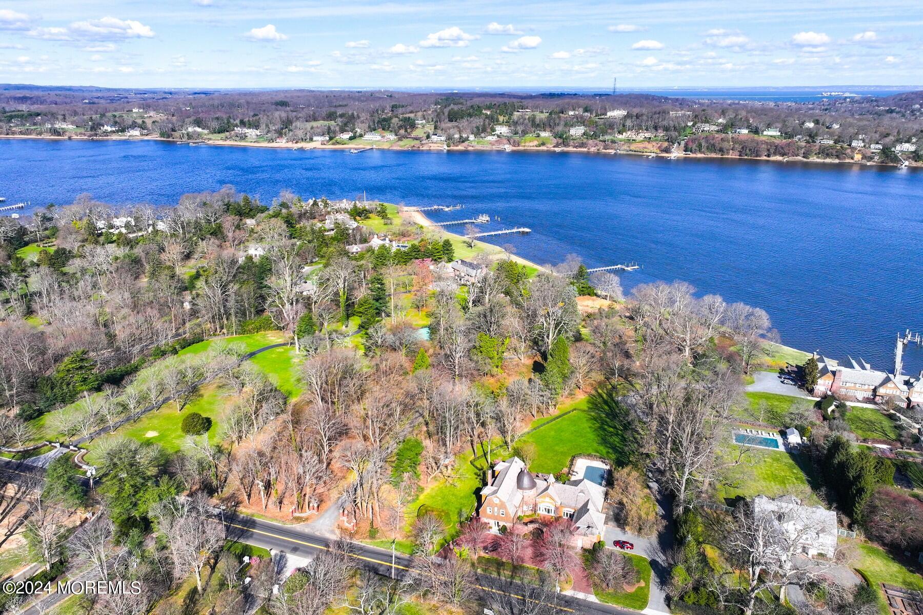 70 River Road Rumson, NJ 07760 - Photo 2 of 30 a view of a city with an ocean