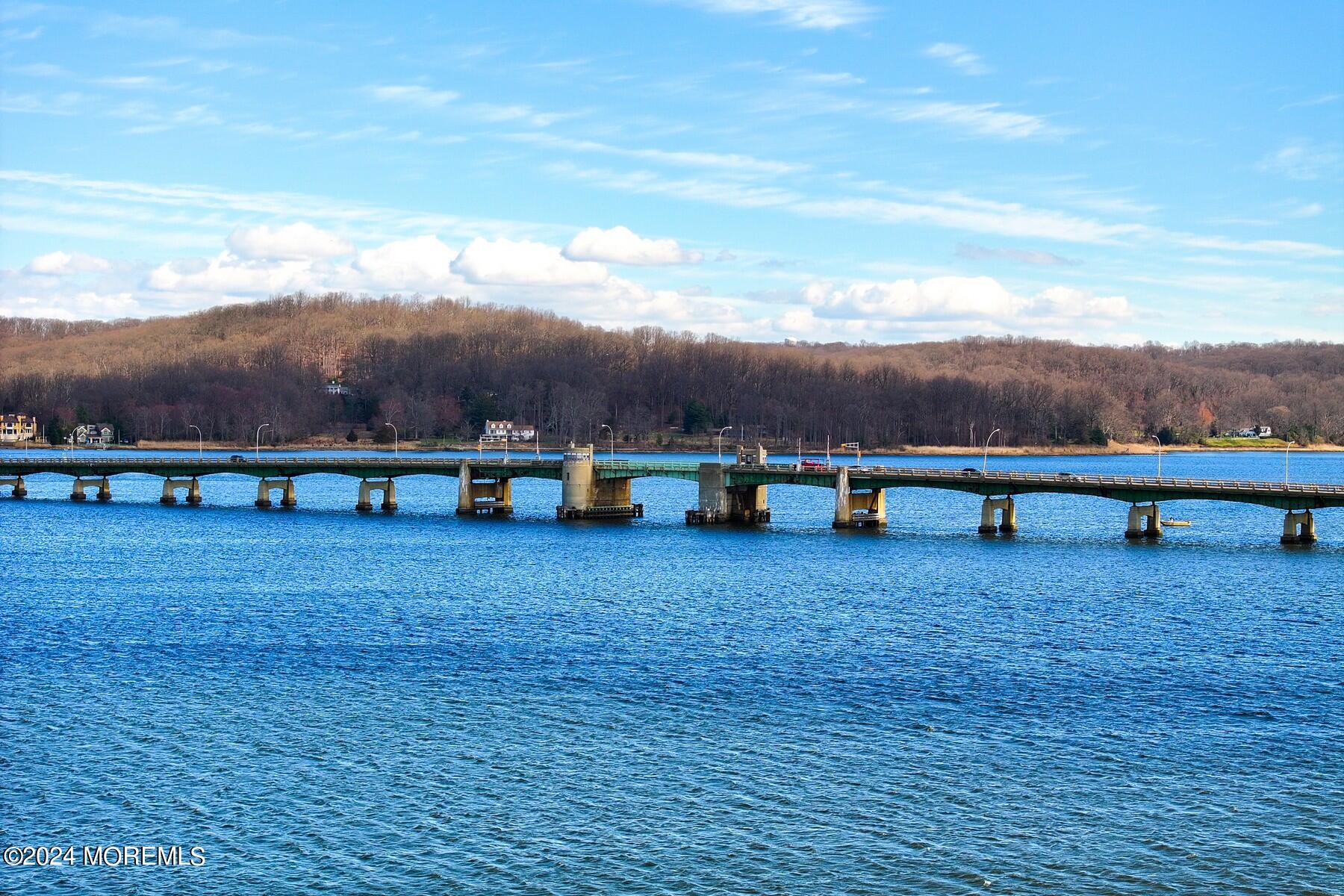 70 River Road Rumson, NJ 07760 - Photo 29 of 30 a view of a big yard with wooden fence