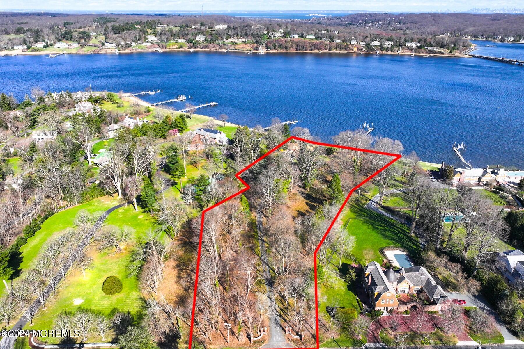70 River Road Rumson, NJ 07760 - Photo 4 of 30 an aerial view of a tennis court