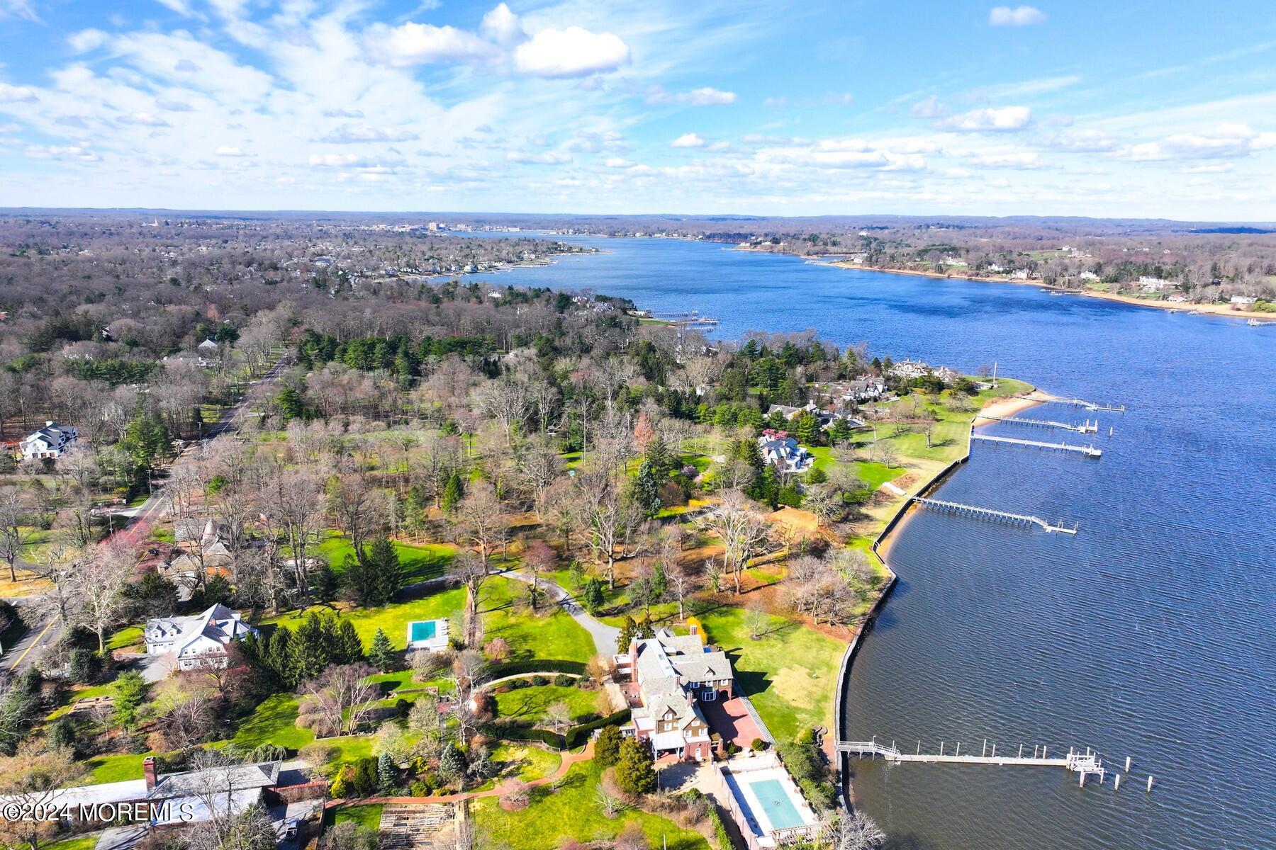 70 River Road Rumson, NJ 07760 - Photo 9 of 30 a view of a city and an ocean